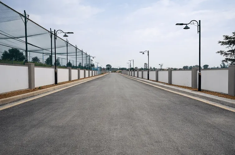 Wide concrete internal road at Kuteera