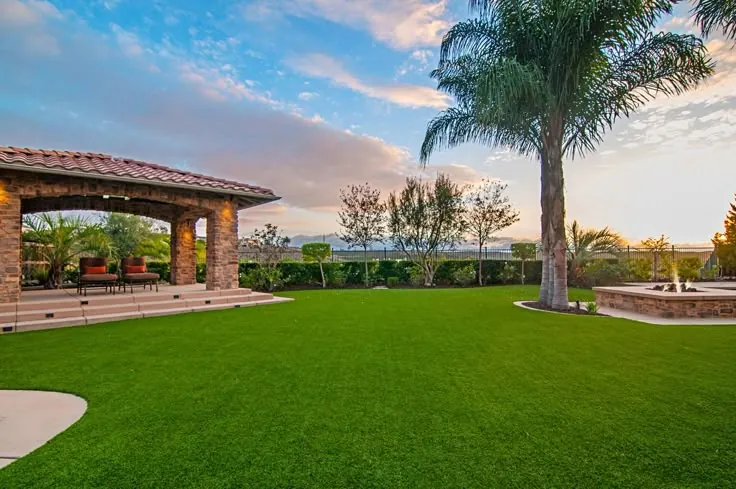Landscaped lawn and gazebo at Kuteera